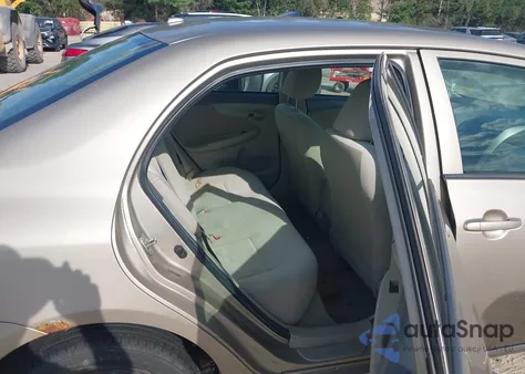 2009 Toyota Corolla Le from USA, damaged, VIN 2T1BU40E99C141524